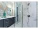 Contemporary bathroom featuring a sleek vanity, a glass-enclosed shower, and premium fixtures at 18026 Reynolds Pkwy, Orlando, FL 32833