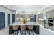 Modern kitchen featuring a large center island, stainless steel appliances, and custom cabinetry at 18026 Reynolds Pkwy, Orlando, FL 32833