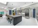 Spacious kitchen featuring a large island with bar seating and stainless steel appliances at 18026 Reynolds Pkwy, Orlando, FL 32833