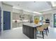 Spacious kitchen featuring a large island with bar seating and stainless steel appliances at 18026 Reynolds Pkwy, Orlando, FL 32833