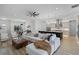 Bright open-concept living room with a view into the kitchen and dining area at 18026 Reynolds Pkwy, Orlando, FL 32833