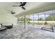 Covered patio leading to a pool and spa area with a seating area and pavers at 18026 Reynolds Pkwy, Orlando, FL 32833