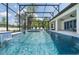 Gorgeous pool featuring a luxurious spa, with an elegant patio, and screened enclosure at 18026 Reynolds Pkwy, Orlando, FL 32833