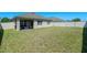 Expansive backyard perfect for outdoor activities, featuring a grill and privacy fence at 1918 Marabou Dr, Davenport, FL 33896