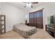 Bedroom featuring neutral tones, television, and shelving at 1918 Marabou Dr, Davenport, FL 33896