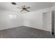 Clean bedroom with grey carpet and natural light at 2311 Huron Trl, Maitland, FL 32751