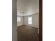 Bedroom featuring carpet flooring, a window, and closet at 2322 Vincent Rd, Orlando, FL 32817
