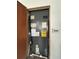 A furnace unit is visible in a utility closet with an energy guide sticker and service information attached at 2322 Vincent Rd, Orlando, FL 32817