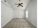 Bright living room with vaulted ceiling and tile flooring at 2322 Vincent Rd, Orlando, FL 32817
