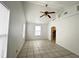 Bright living room with vaulted ceiling and tile flooring at 2322 Vincent Rd, Orlando, FL 32817