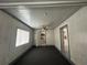View of bright room with carpet, window and ceiling fan at 2322 Vincent Rd, Orlando, FL 32817