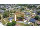 Aerial view of a home featuring a large fenced lot in a residential neighborhood at 241 Churchill Ct, Kissimmee, FL 34758