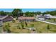 Lovely single-story home with a spacious yard, mature trees, and a charming outdoor setting at 241 Churchill Ct, Kissimmee, FL 34758