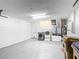Spacious laundry room/garage featuring a modern washer and dryer, with ample space for storage at 241 Churchill Ct, Kissimmee, FL 34758