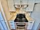 Modern stainless steel double oven range with granite countertops and stylish backsplash at 241 Churchill Ct, Kissimmee, FL 34758