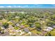 A high aerial view showcasing the surrounding neighborhood and landscape at 2812 E Michigan St, Orlando, FL 32806