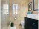Bathroom featuring tiled shower with glass door and neutral color scheme at 2812 E Michigan St, Orlando, FL 32806