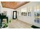 Relaxing sunroom with tiled floors, wood ceiling, and lots of natural light at 2812 E Michigan St, Orlando, FL 32806