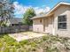 Private backyard with patio area and fencing at 2850 Tremont Dr, Eustis, FL 32726