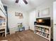 Bedroom featuring a bookshelf with decor and personal touches at 2850 Tremont Dr, Eustis, FL 32726