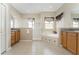 Spacious main bathroom with double vanities, a soaking tub, and separate shower at 36300 Grand Island Oaks Cir, Grand Island, FL 32735