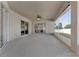 Spacious covered patio with ceiling fan, sliding glass doors, and view of backyard at 36300 Grand Island Oaks Cir, Grand Island, FL 32735
