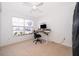 Bright bedroom with neutral carpet, a window with blinds, and overhead lighting above a desk at 4011 Venetian Bay Dr # 103, Kissimmee, FL 34741