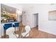 Bright dining room features wood floors, and a stylish chandelier at 4011 Venetian Bay Dr # 103, Kissimmee, FL 34741