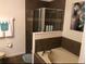 Bathroom featuring a separate tub and shower with tile surround at 4126 Hedge Maple Pl, Winter Springs, FL 32708