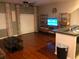 Open-concept living room with hardwood floors and ample natural light at 4126 Hedge Maple Pl, Winter Springs, FL 32708