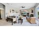 Open living room with fireplace and patio access offers ample seating and natural light at 421 Thomez Ct, Lake Mary, FL 32746