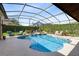 Inviting pool area with lush landscaping, comfortable seating, and a relaxing atmosphere at 421 Thomez Ct, Lake Mary, FL 32746