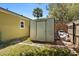 Backyard with shed and additional covered space for storage alongside house at 4371 Vestawood Ct, Sanford, FL 32773