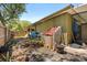 Backyard features a planting area and mature trees at 4371 Vestawood Ct, Sanford, FL 32773