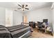 Bedroom featuring hardwood floors, ceiling fan, natural light and a workstation at 4371 Vestawood Ct, Sanford, FL 32773
