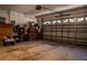 Spacious garage featuring ample storage and a functional automatic door at 4522 Weeping Willow Cir, Casselberry, FL 32707
