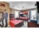 Whimsical ' bedroom featuring bunk beds, themed decor, brick accent wall, and character artwork at 4800 Lullaby Ln, Kissimmee, FL 34746