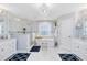 Bright bathroom with a soaking tub under a window and a glass-enclosed shower at 5297 Mill Stream Dr, St Cloud, FL 34771