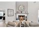 Elegant fireplace with a decorative mantel and a cozy seating area, perfect for relaxing evenings at 5297 Mill Stream Dr, St Cloud, FL 34771