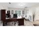 Home office with wood floors, lots of natural light and built-in storage at 5297 Mill Stream Dr, St Cloud, FL 34771