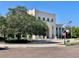 View of a commercial building with clean architectural lines, manicured landscaping and inviting outdoor space at 560 Garden Heights Dr, Winter Garden, FL 34787