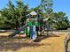 Community playground includes slides and climbing structures at 560 Garden Heights Dr, Winter Garden, FL 34787