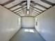 Interior of the shed with windows, lighting and vaulted ceiling at 560 Garden Heights Dr, Winter Garden, FL 34787