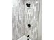 This shower features white and gray walls and sleek black hardware at 560 Garden Heights Dr, Winter Garden, FL 34787