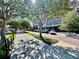 Street view showcasing a charming neighborhood and brick-lined sidewalks at 560 Garden Heights Dr, Winter Garden, FL 34787