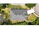 Aerial view of roof and backyard, mature landscaping, and view of the home's driveway at 5815 Pine Grove Run, Oviedo, FL 32765