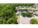 Aerial view of home in a neighborhood with mature landscaping and cul-de-sac at 5815 Pine Grove Run, Oviedo, FL 32765