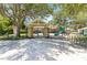 A playground with a slide, picnic pavilion, and multiple bike racks at 5815 Pine Grove Run, Oviedo, FL 32765