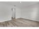 Spacious bedroom featuring modern wood-look floors, neutral paint and recessed lighting at 601 Marion Oaks Blvd, Ocala, FL 34473