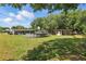 Backyard with pool and shed, perfect for outdoor activities and storage at 62 Magnolia Dr, Debary, FL 32713